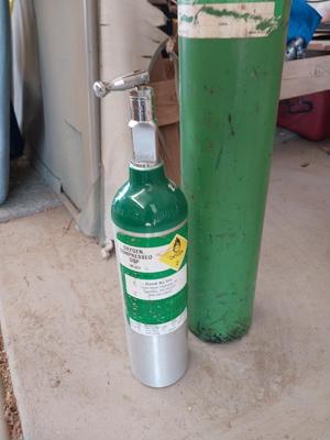 TWO OXYGEN TANKS
