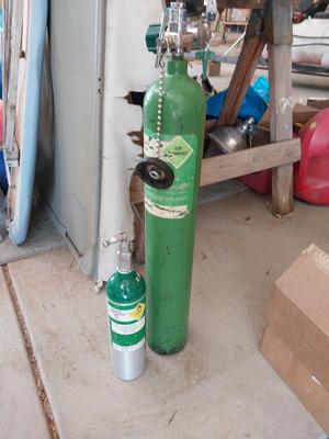 TWO OXYGEN TANKS