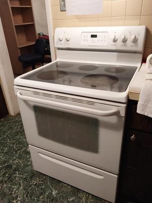 WHITE FRIGIDAIRE ELECTRIC STOVE WITH STORAGE DRAWER