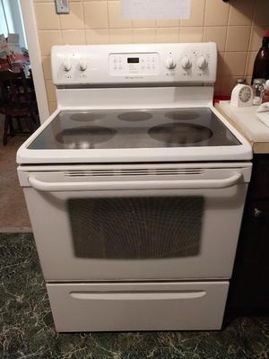 WHITE FRIGIDAIRE ELECTRIC STOVE WITH STORAGE DRAWER