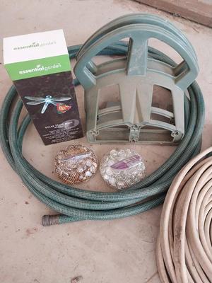 HOSES-HOSE HOLDERS- DECROTIVE MARBLES AND SOLAR STAKE LIGHT