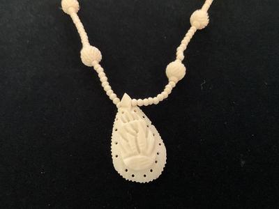 Vintage White/cream Carved Bone NK and PE