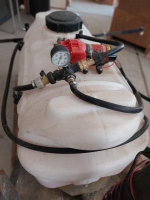 HIGH FLO SPREADER WITH HOSE AND HANDLE SPRAYER WITH TRAILER