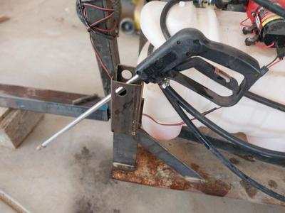 HIGH FLO SPREADER WITH HOSE AND HANDLE SPRAYER WITH TRAILER