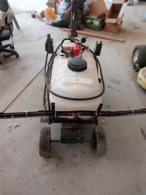HIGH FLO SPREADER WITH HOSE AND HANDLE SPRAYER WITH TRAILER