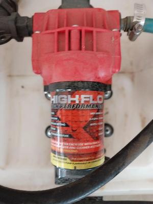 HIGH FLO SPREADER WITH HOSE AND HANDLE SPRAYER WITH TRAILER