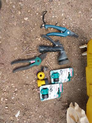 LAWN TRACTOR-SPRAYER HAND TRIMMERS AND HOSE MENDERS