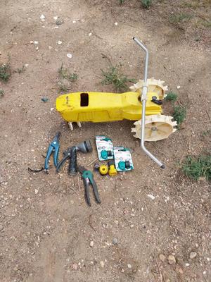 LAWN TRACTOR-SPRAYER HAND TRIMMERS AND HOSE MENDERS