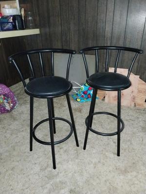 TWO BLACK METAL BAR STOOLS