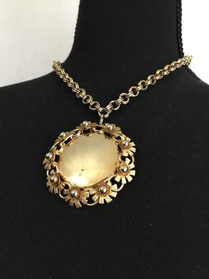 Gold tone chain vintage necklace with flower pendant