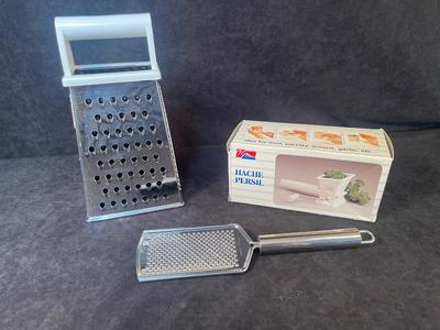Lot 11. Graters and Herb Cutter