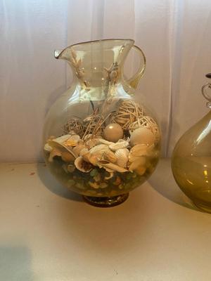 LARGE AMBER COLORED GLASS BOTTLE AND PITCHER