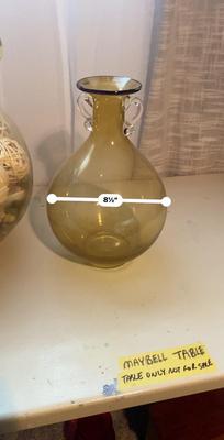 LARGE AMBER COLORED GLASS BOTTLE AND PITCHER