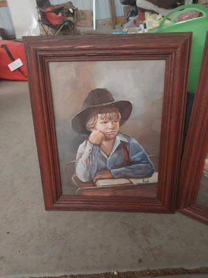 Two framed signed pictures