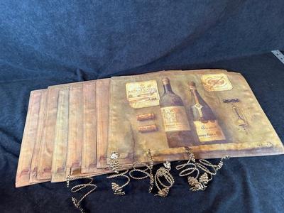 Lot 50. Wine-themed Placemats and napkin rings