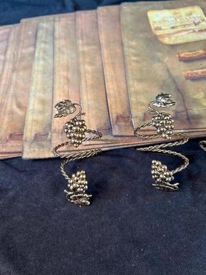 Lot 50. Wine-themed Placemats and napkin rings