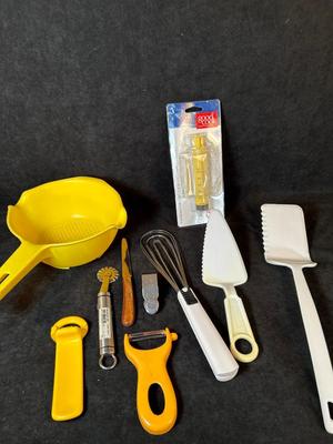 Lot 63. Utensils and Colander