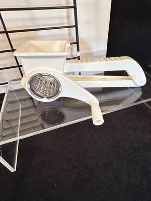 Lot 71. Pizza Stone & Accessories