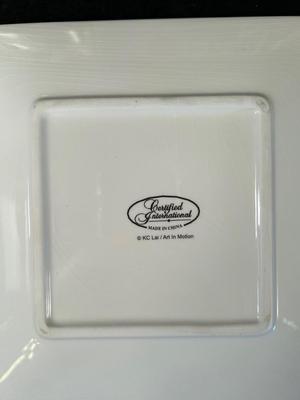 Lot 81. French-themed Plate Set