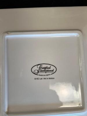 Lot 82. French-themed Plate Set