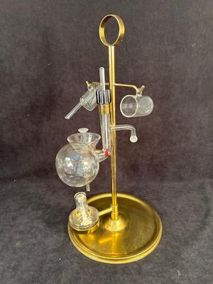 Lot 107. Glass Whiskey Still