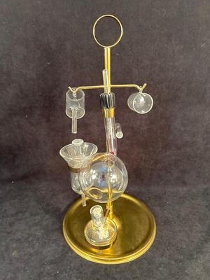Lot 107. Glass Whiskey Still