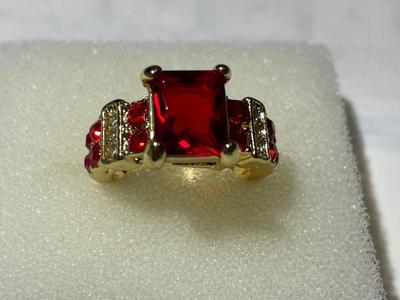 Ladies New Never Worn Gold-tone Fashion Ring Size-Full 7 w/Red Crystal Stones as Pictured.