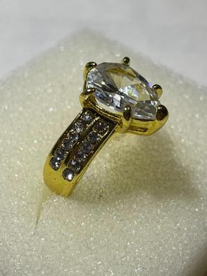 Ladies New Never Worn Gold-tone Fashion Ring Size-6.5 w/Crystal Stones as Pictured.