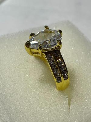 Ladies New Never Worn Gold-tone Fashion Ring Size-6.5 w/Crystal Stones as Pictured.
