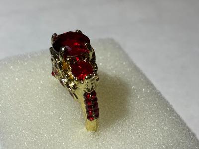 Ladies New Never Worn Gold-tone Fashion Ring Size-7.5 w/Red Crystal Stones as Pictured.