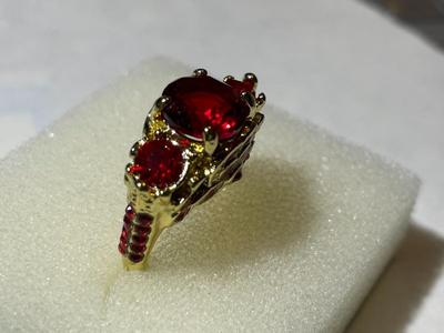 Ladies New Never Worn Gold-tone Fashion Ring Size-7.5 w/Red Crystal Stones as Pictured.