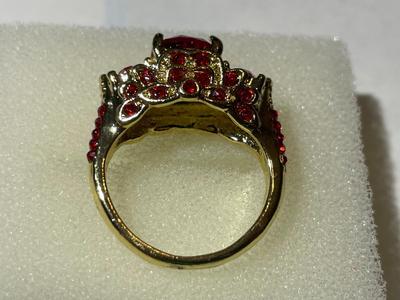 Ladies New Never Worn Gold-tone Fashion Ring Size-7.5 w/Red Crystal Stones as Pictured.