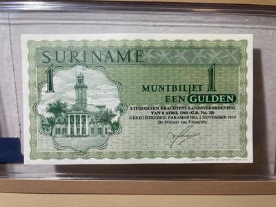 Surinam 1 Gulden 1974 Banknote/Currency in Uncirculated Condition by Fleetwood as Pictured.
