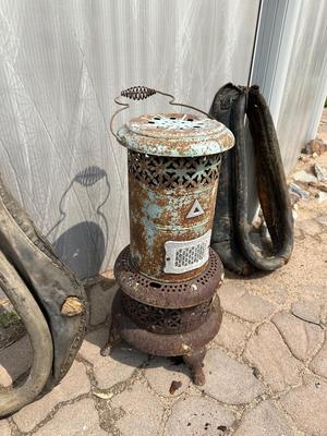 2 LEATHER HORSE COLLARS AND A WOOD STOVE
