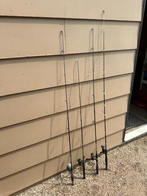 4 FISHING POLES WITH REELS
