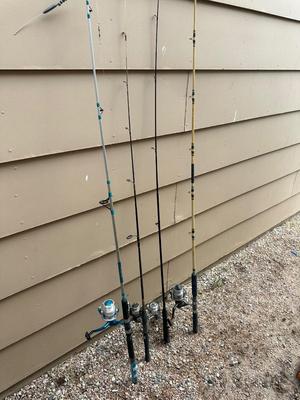 4 FISHING POLES WITH REELS