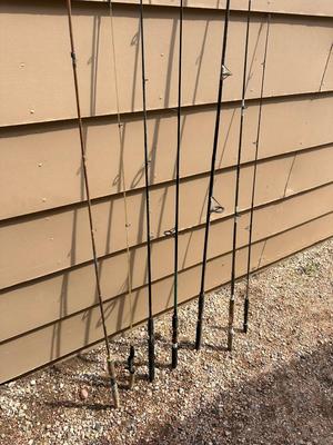 A VARIETY OF FISHING POLES