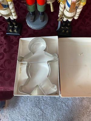 THE OUT OF TOWNER NUTCRACKER AND HIS TWO LITTLE SIDE KICKS, WITH A GINGERBREAD MAN COOKIE CUTTER