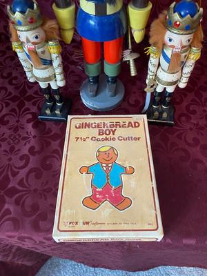 THE OUT OF TOWNER NUTCRACKER AND HIS TWO LITTLE SIDE KICKS, WITH A GINGERBREAD MAN COOKIE CUTTER