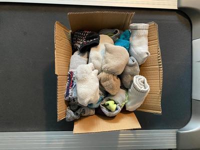 TOP SHELF OF CLOSET, BELTS HATS, SCARVES, & SOCKS