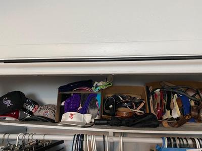 TOP SHELF OF CLOSET, BELTS HATS, SCARVES, & SOCKS