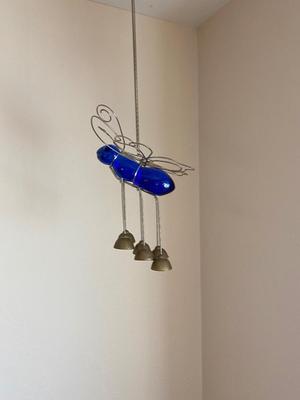 PEWTER CURTAIN HANGERS AND GLASS BUG WIND-CHIME