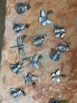 PEWTER CURTAIN HANGERS AND GLASS BUG WIND-CHIME