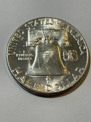 1955 BU CONDITION FRANKLIN SILVER HALF DOLLAR AS PICTURED.