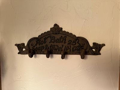 2 CAST IRON "HAIRCUT" AND "HOT BATH" WALL DECOR WITH CLIPS