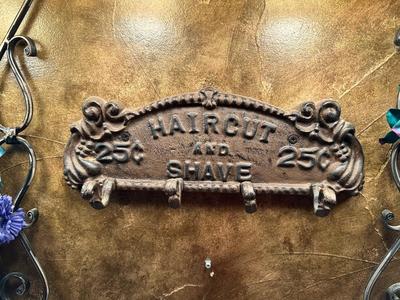 2 CAST IRON "HAIRCUT" AND "HOT BATH" WALL DECOR WITH CLIPS