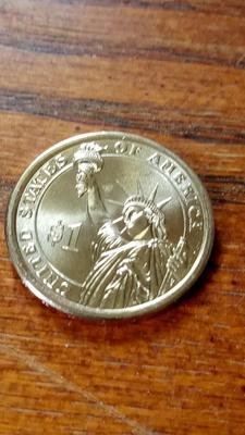 LOT 47 - RONALD REAGAN DOLLAR COIN
