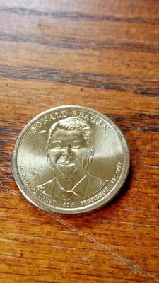 LOT 47 - RONALD REAGAN DOLLAR COIN