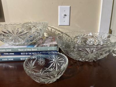 3 pressed glass bowls and 3 hardcover cookbooks