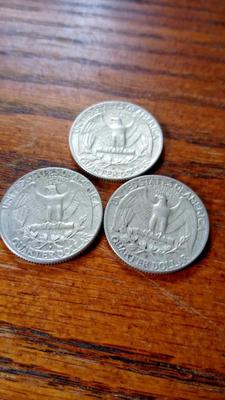 LOT 67 - THREE SILVER WASHINGTON QUARTERS